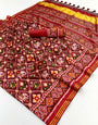 Twirling Maroon Handloom Patola Soft Silk Saree