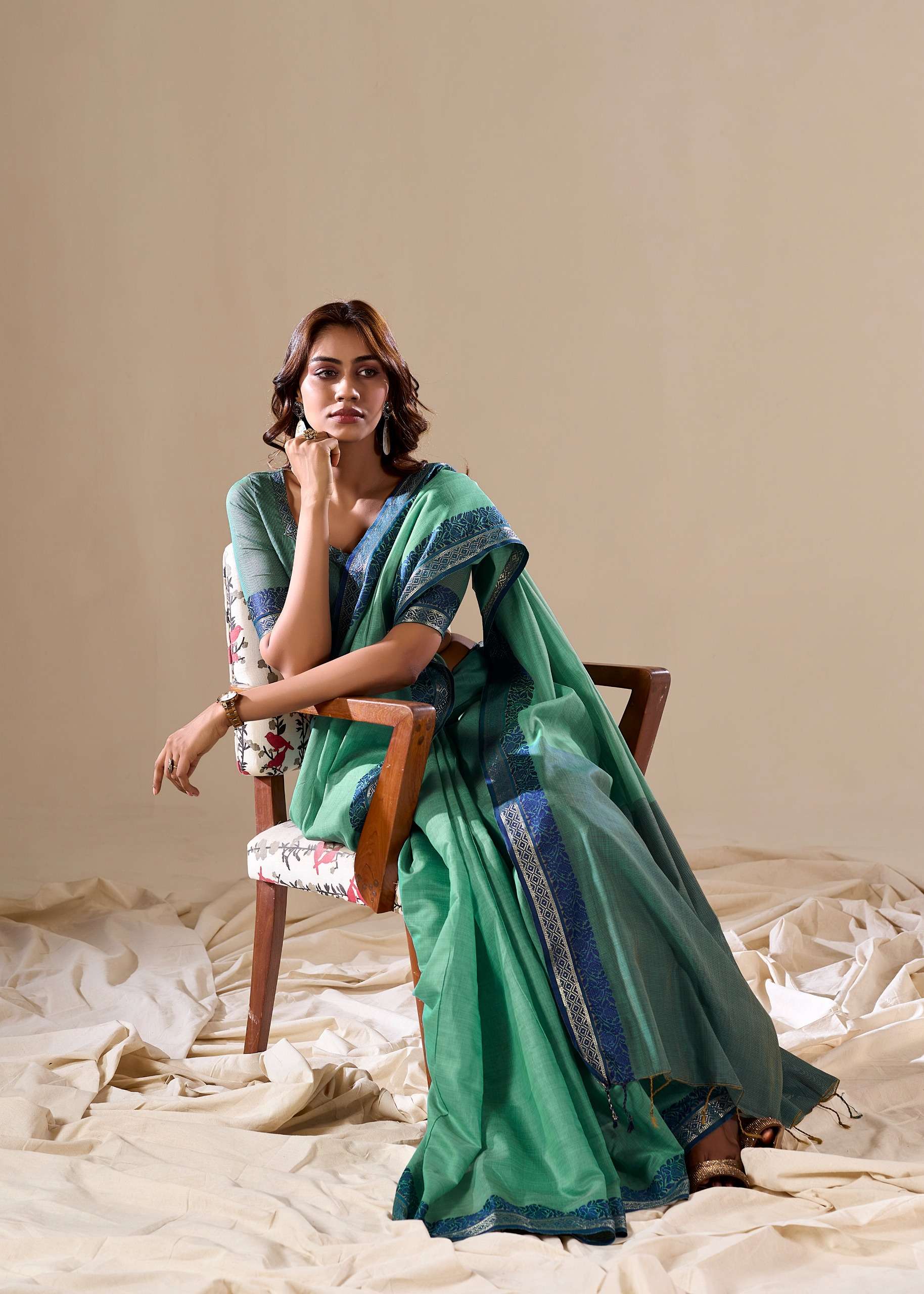 Flourishing Green Plain Cotton Saree