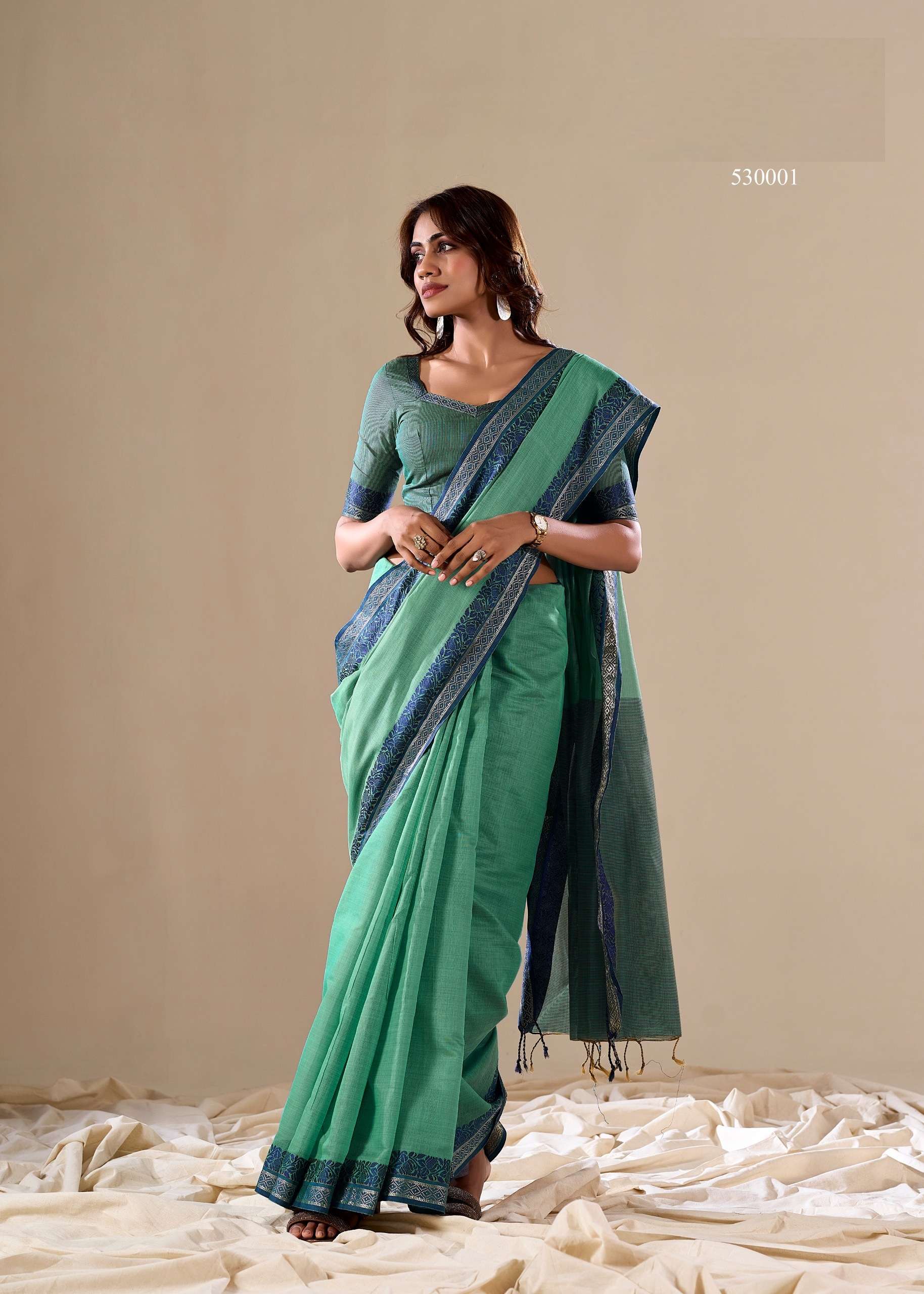 Flourishing Green Plain Cotton Saree