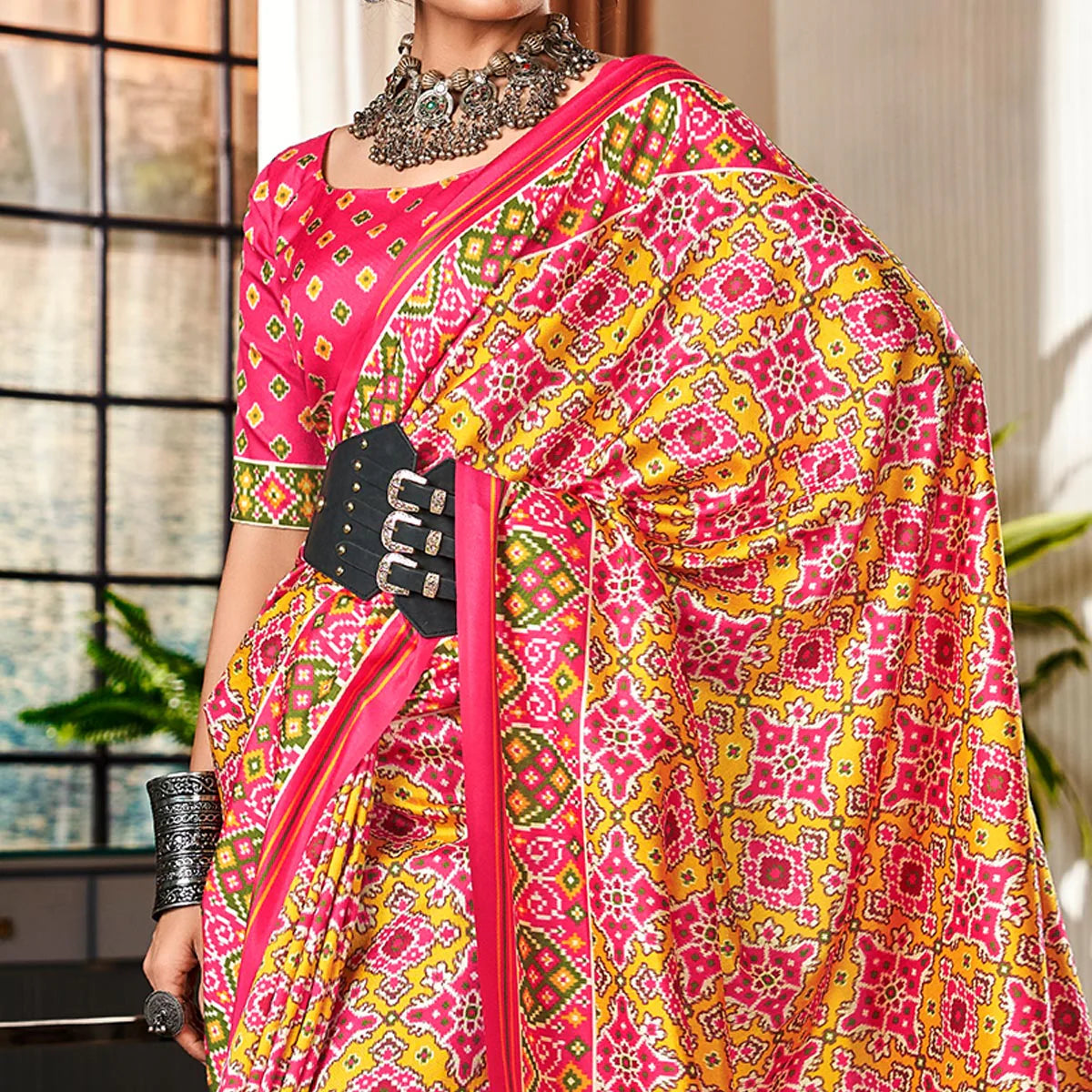 Pink And Mustard Tussar Patola Silk Saree