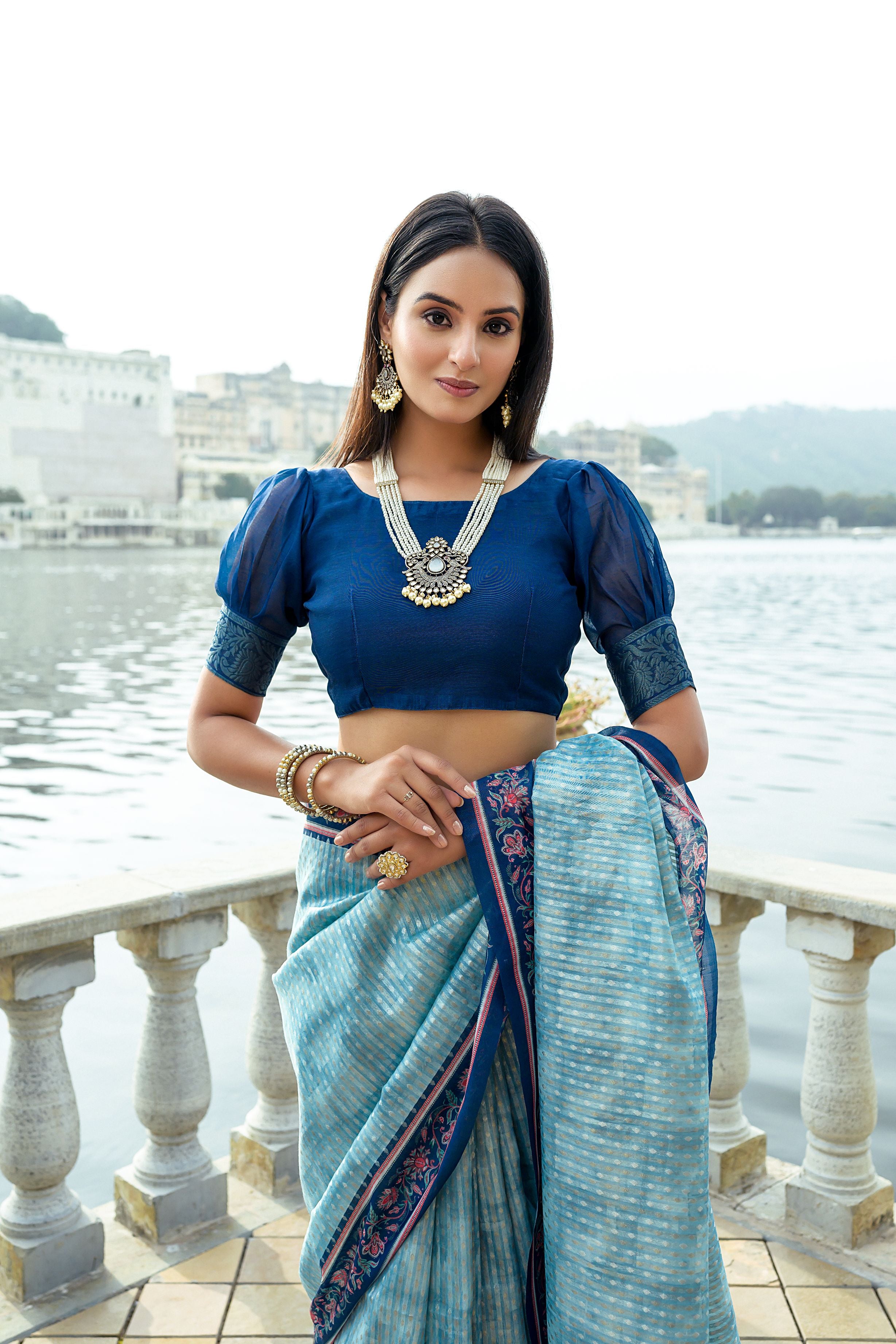 Sky Blue Soft Raw Silk Saree With Flower Printed Contrast Border