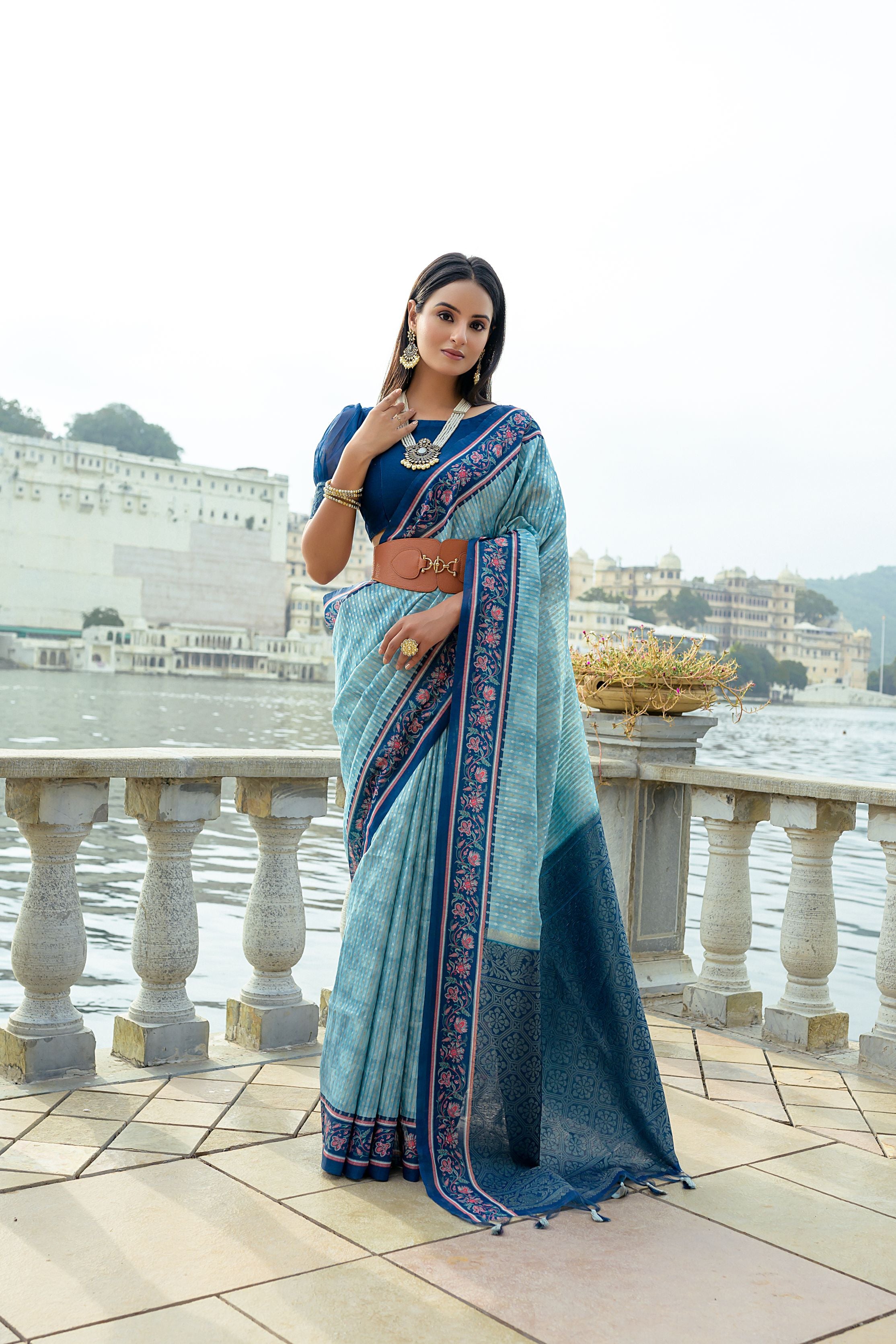 Sky Blue Soft Raw Silk Saree With Flower Printed Contrast Border