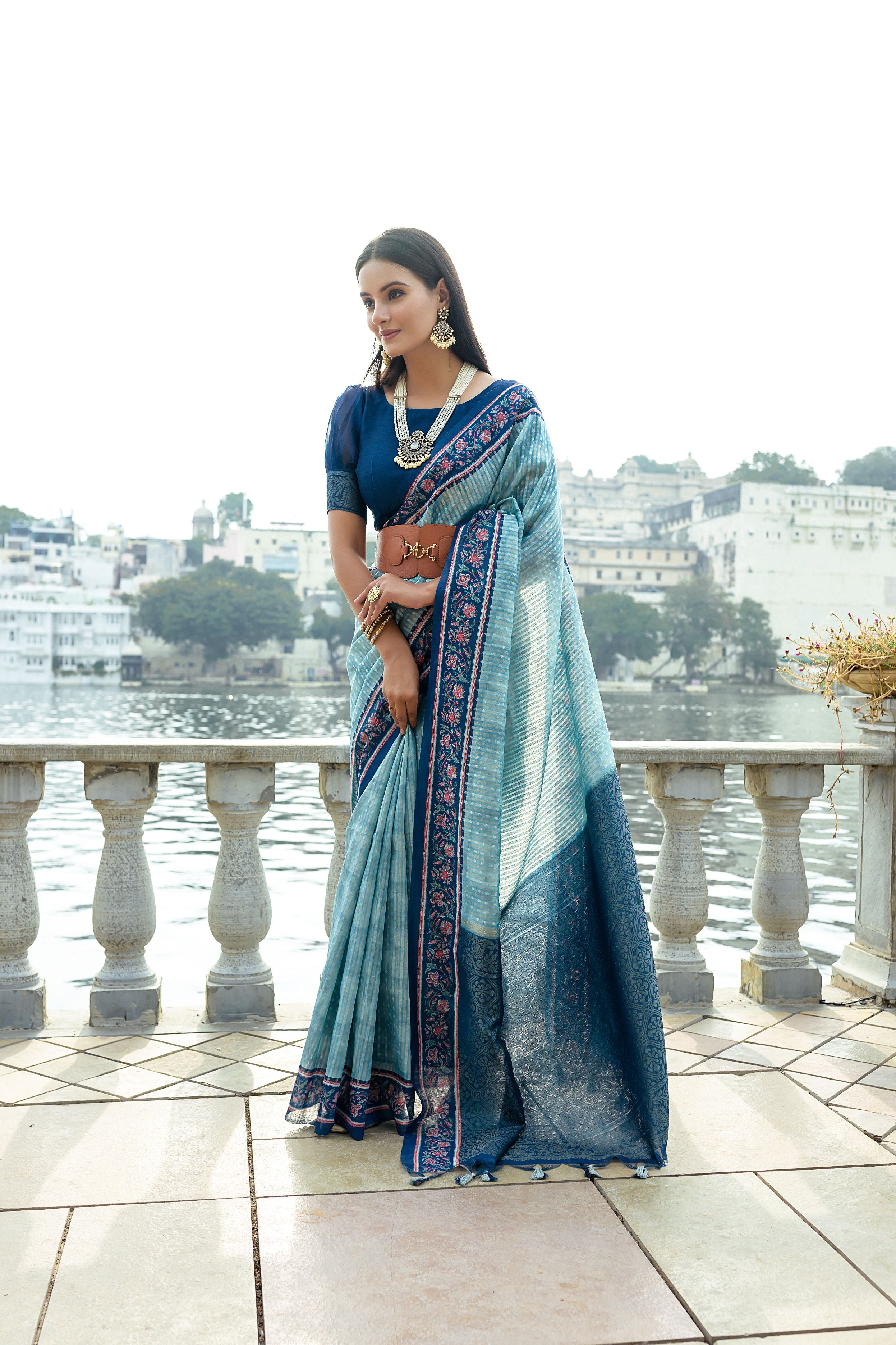 Sky Blue Soft Raw Silk Saree With Flower Printed Contrast Border