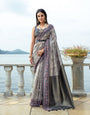 Glaucous Grey Soft Raw Silk Saree With Flower Printed Contrast Border