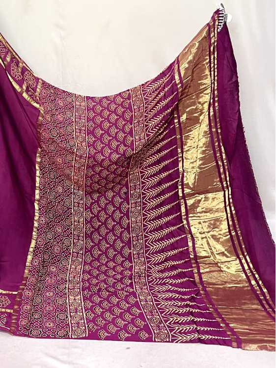 Hot Pink Hand Block Ajrakh Saree in Pure Modal Silk with Gharchola Border and Zari Detailing