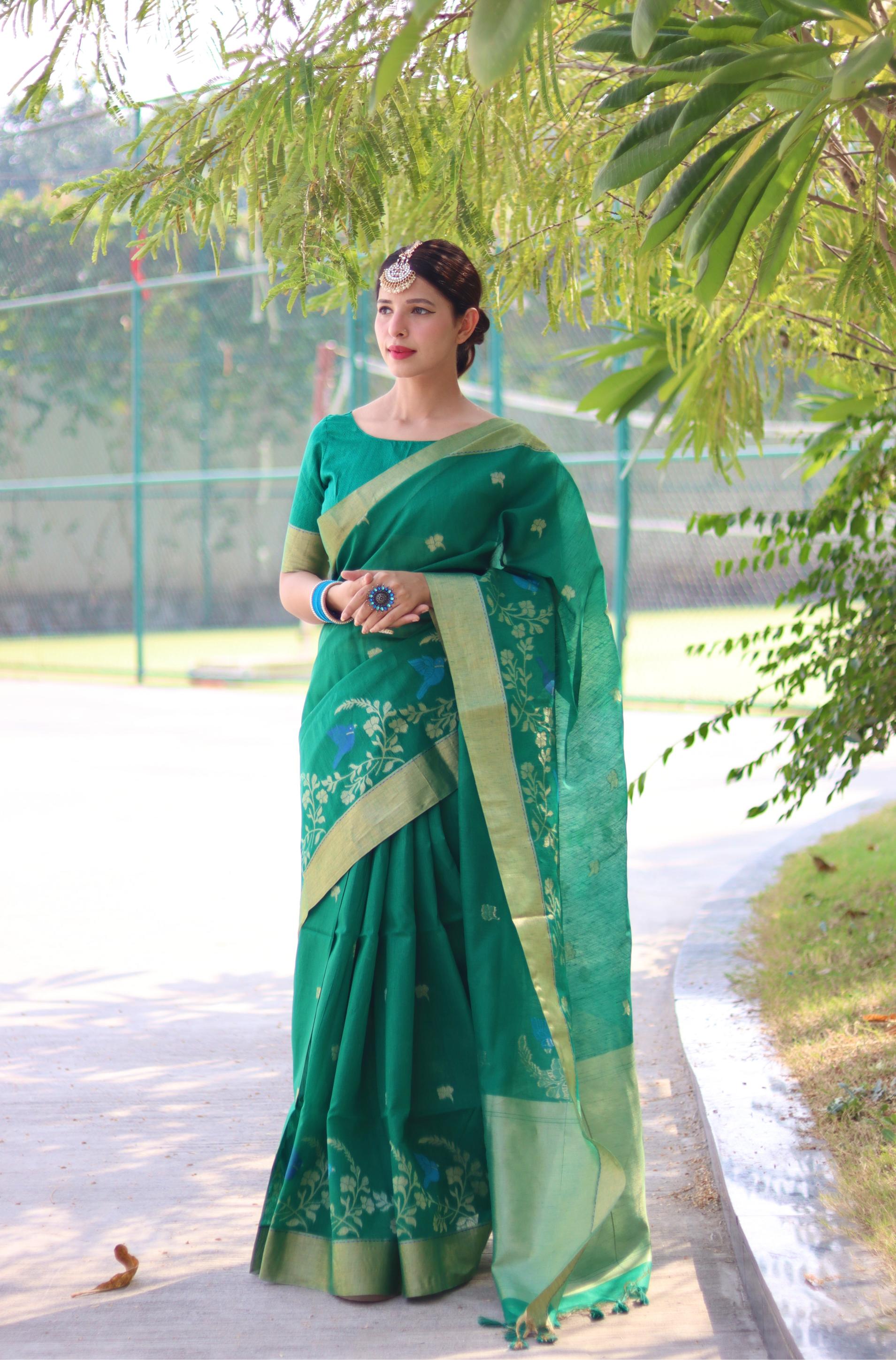 Stunner Green Linen Silk Saree With Hypnotic Blouse Piece