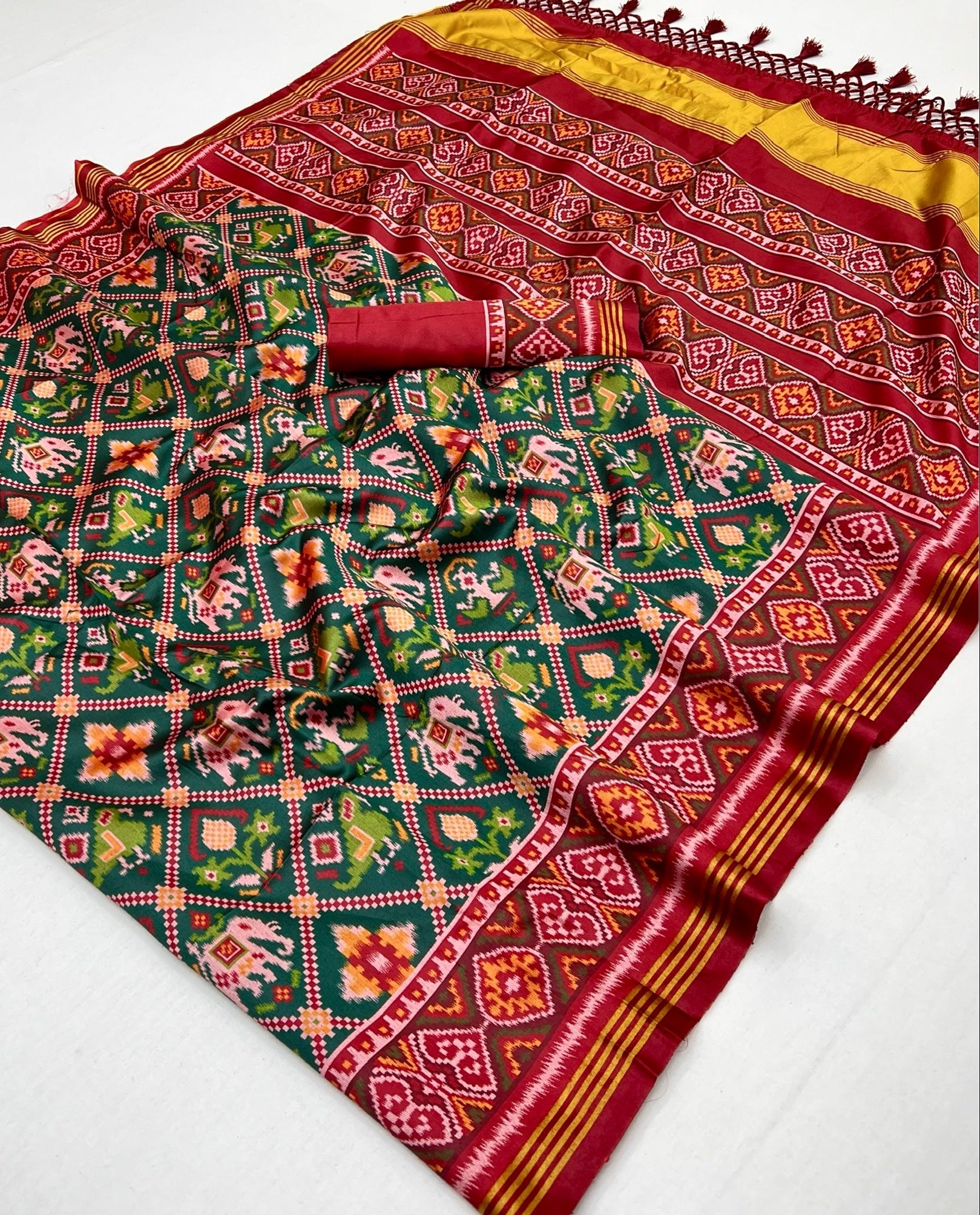 Impressive Green Handloom Patola Soft Silk Saree