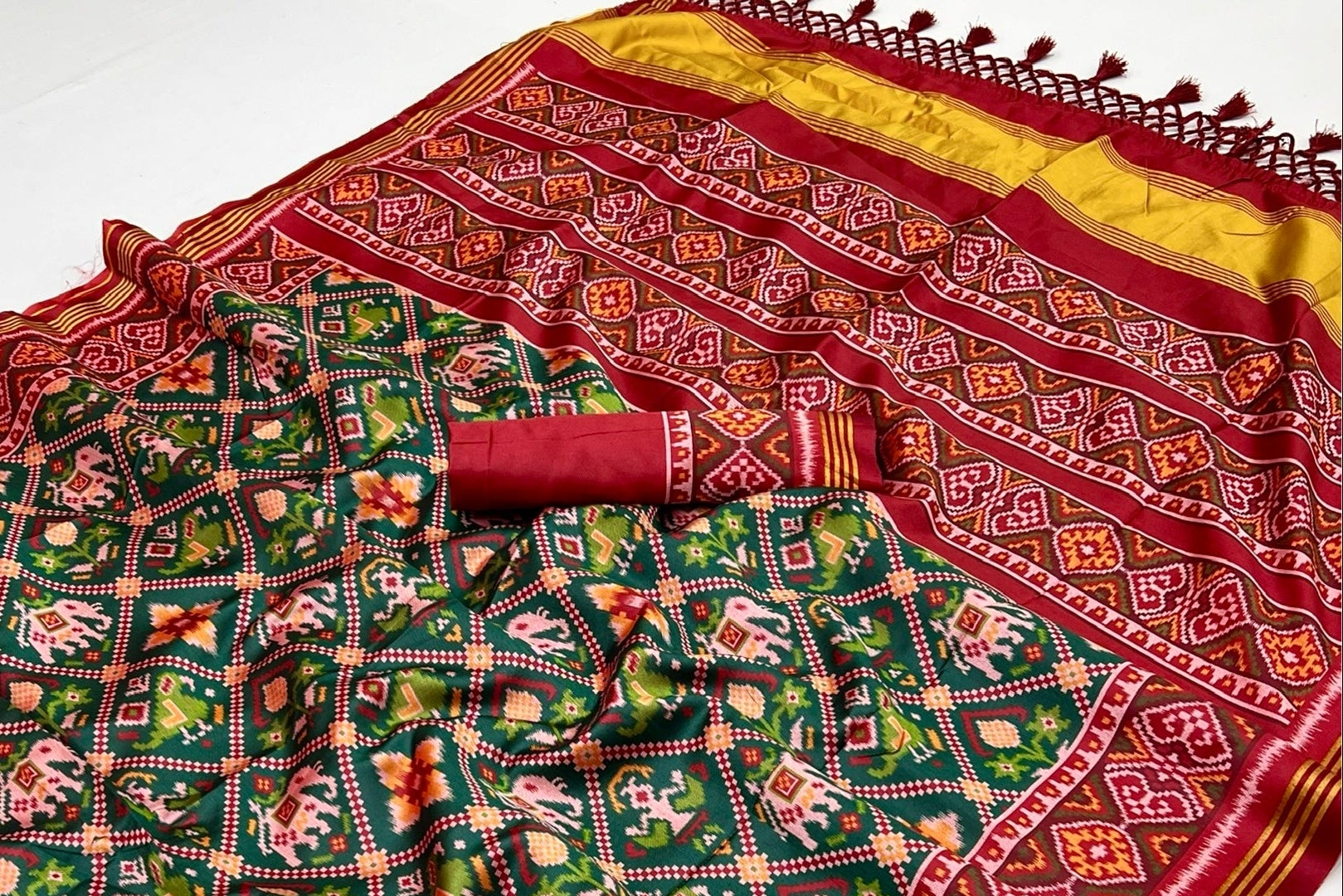 Impressive Green Handloom Patola Soft Silk Saree