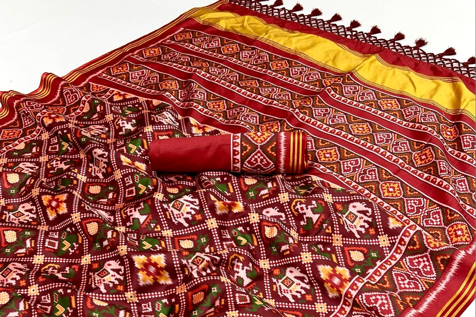 Twirling Maroon Handloom Patola Soft Silk Saree