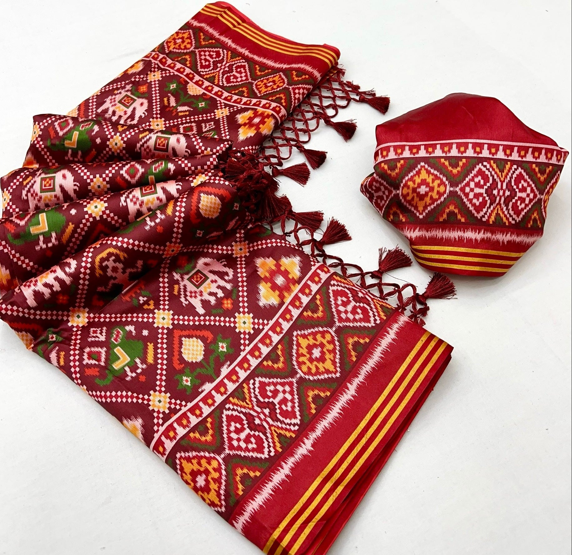 Twirling Maroon Handloom Patola Soft Silk Saree