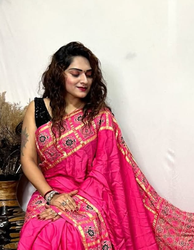 Pink Hand Block Ajrakh Saree in Pure Modal Silk with Gharchola Border and Zari Detailing