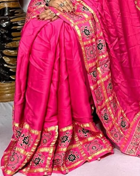 Pink Hand Block Ajrakh Saree in Pure Modal Silk with Gharchola Border and Zari Detailing
