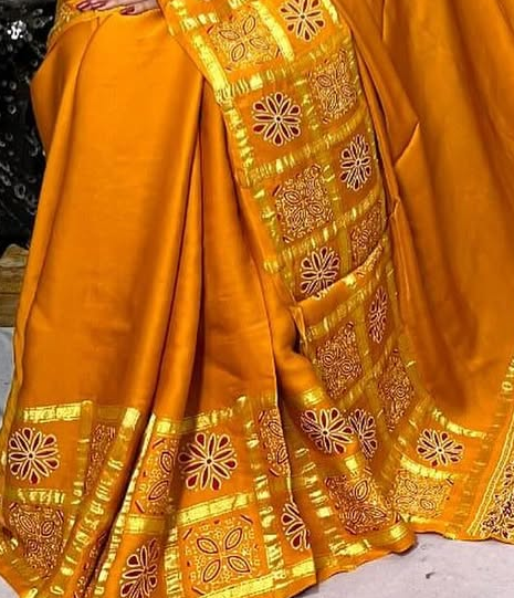 Musterd Hand Block Ajrakh Saree in Pure Modal Silk with Gharchola Border and Zari Detailing