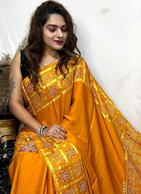 Musterd Hand Block Ajrakh Saree in Pure Modal Silk with Gharchola Border and Zari Detailing