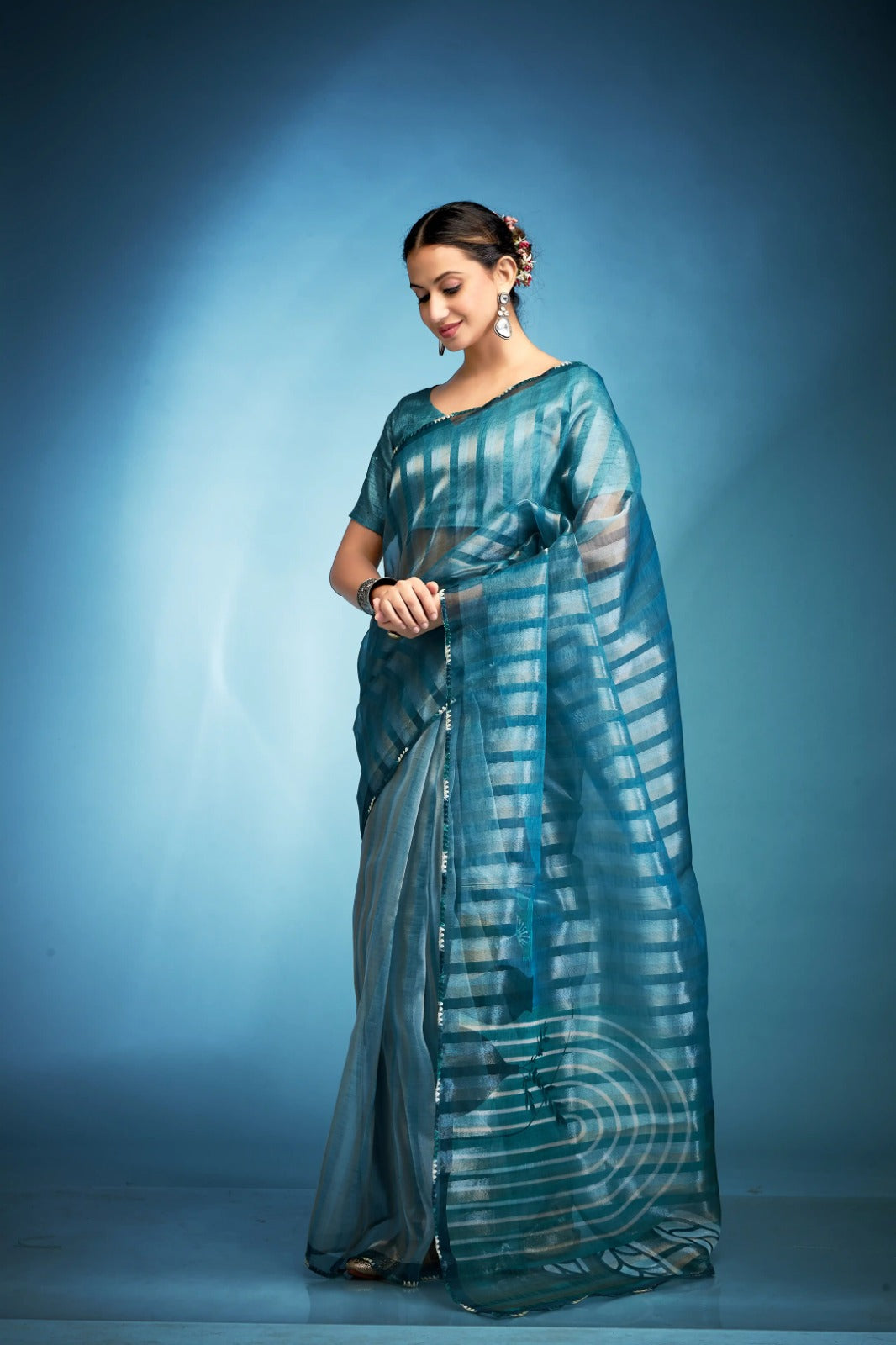 Lavish Aqua Blue Printed Tissue Saree