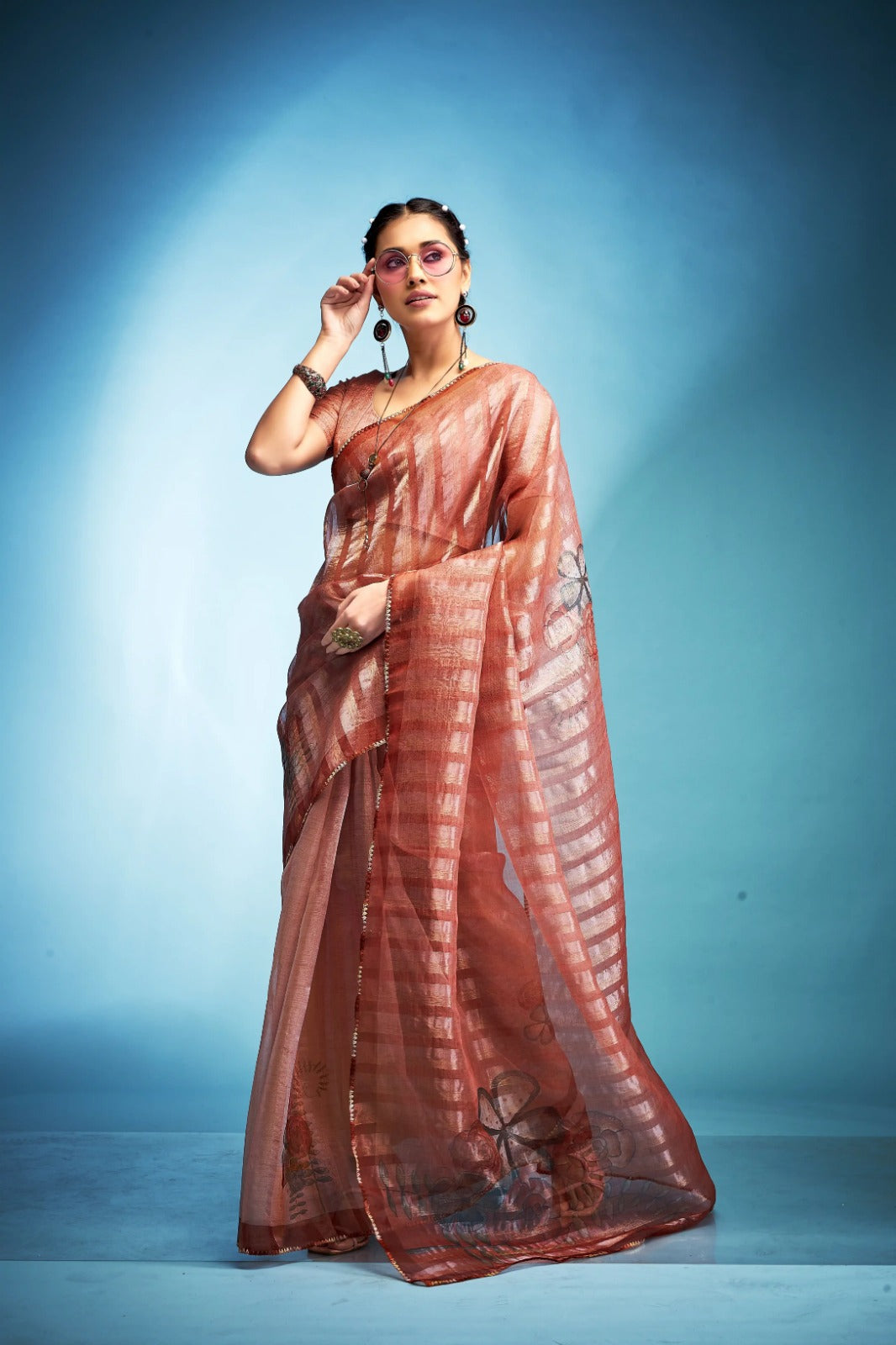 Exquisite Peach  Blue Printed Tissue Saree