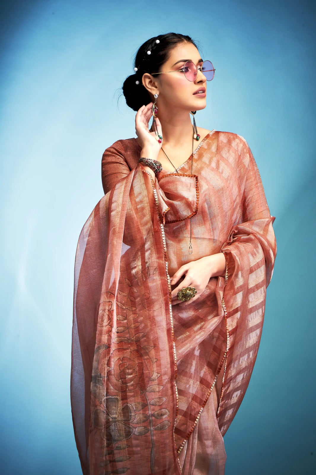 Exquisite Peach  Blue Printed Tissue Saree