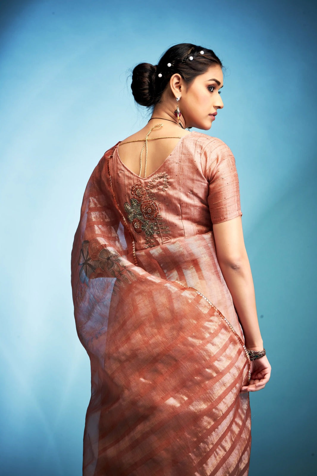 Exquisite Peach  Blue Printed Tissue Saree