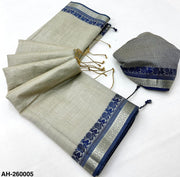 Viral Grey Handloom Silk Saree with Contrast Border & Tussels