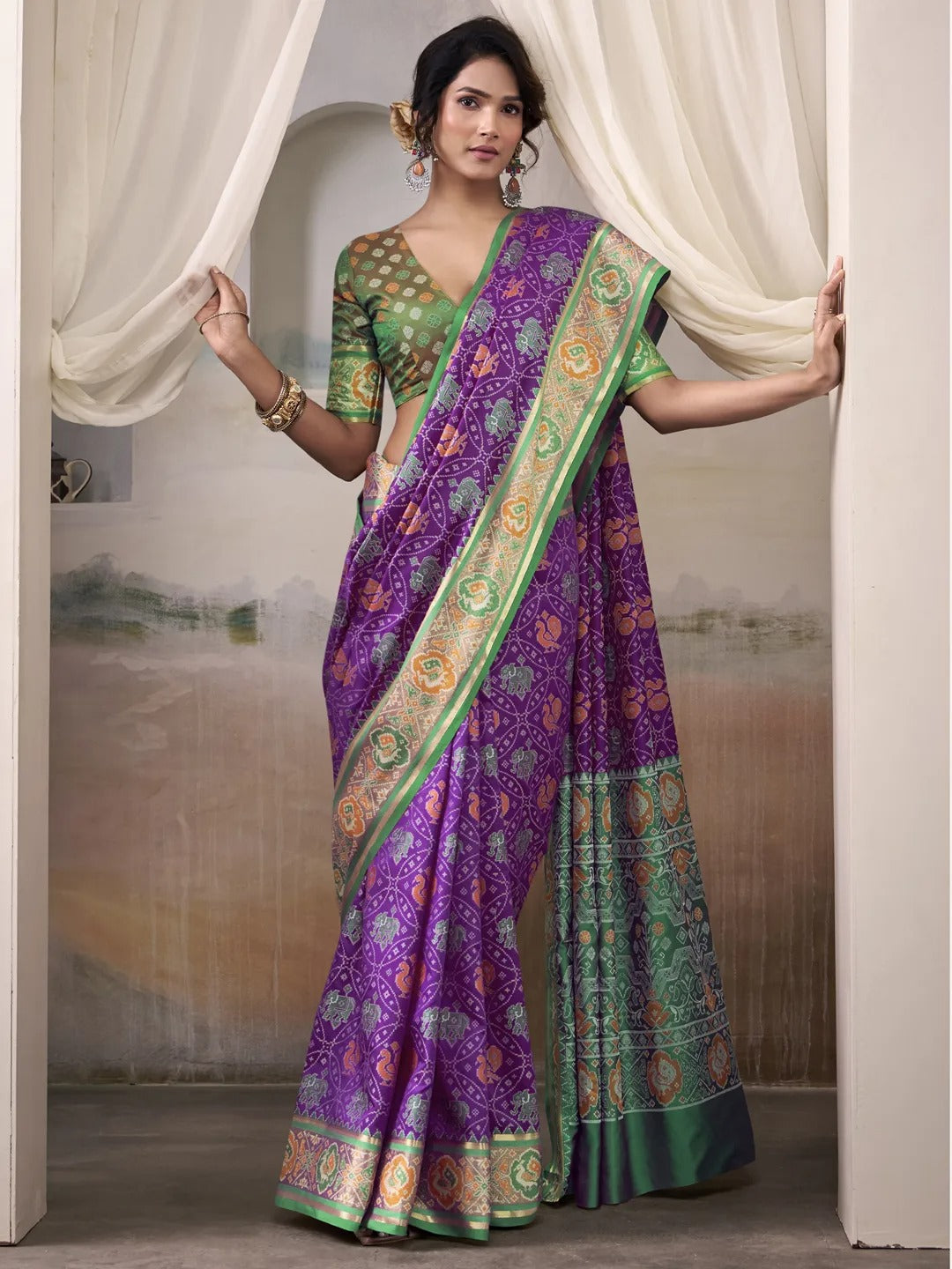 Tyrian Purple Patola Silk Saree With Weaving Border